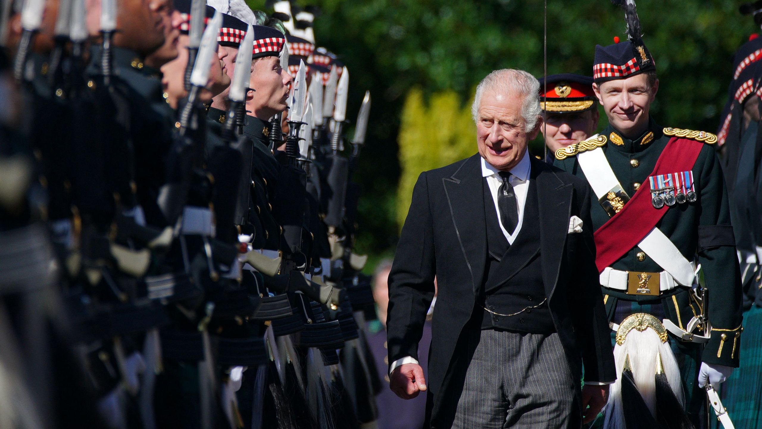 Image may contain Charles Prince of Wales Military Uniform Military Human Person Tie Accessories Accessory and Suit