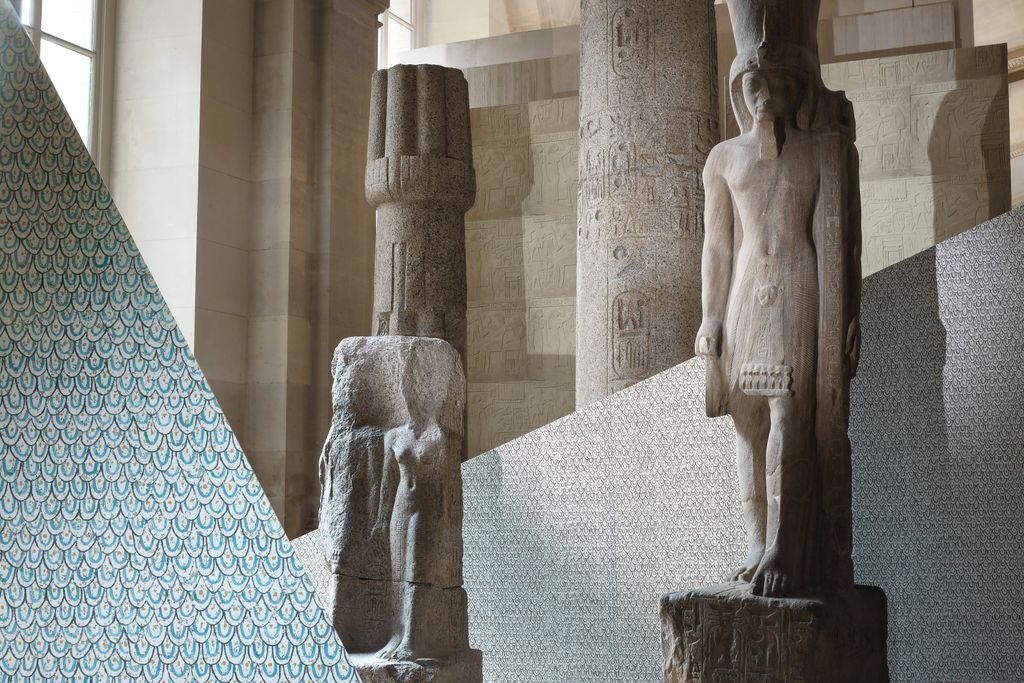 Image may contain Building Architecture Art Sculpture Column and Pillar