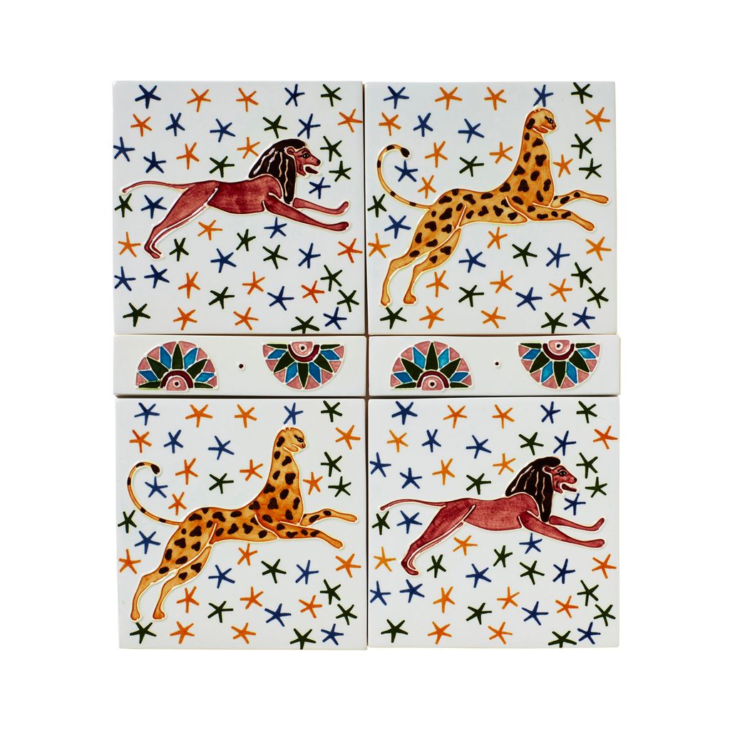 Image may contain Rug Animal Bird Pattern Text Alphabet Nature Outdoors Ocean Water and Sea