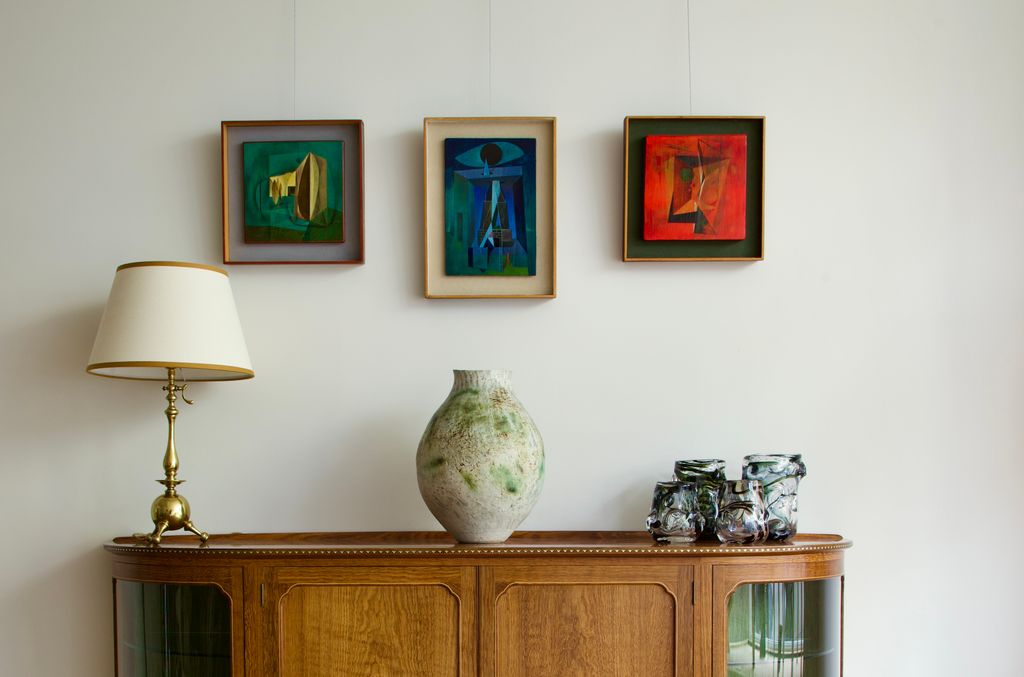 Image may contain Lamp Furniture Interior Design Indoors Table Lamp Fruit Food Pear Plant and Sideboard