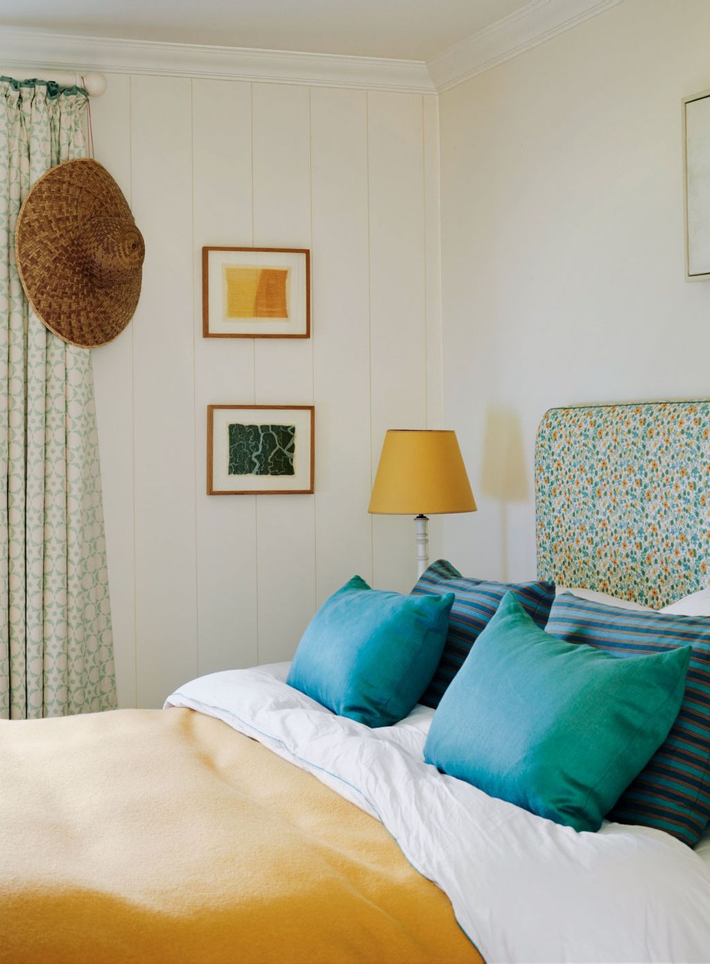 Image may contain Furniture Bed Couch Living Room Indoors Room Lamp Table Lamp Cushion and Bedroom