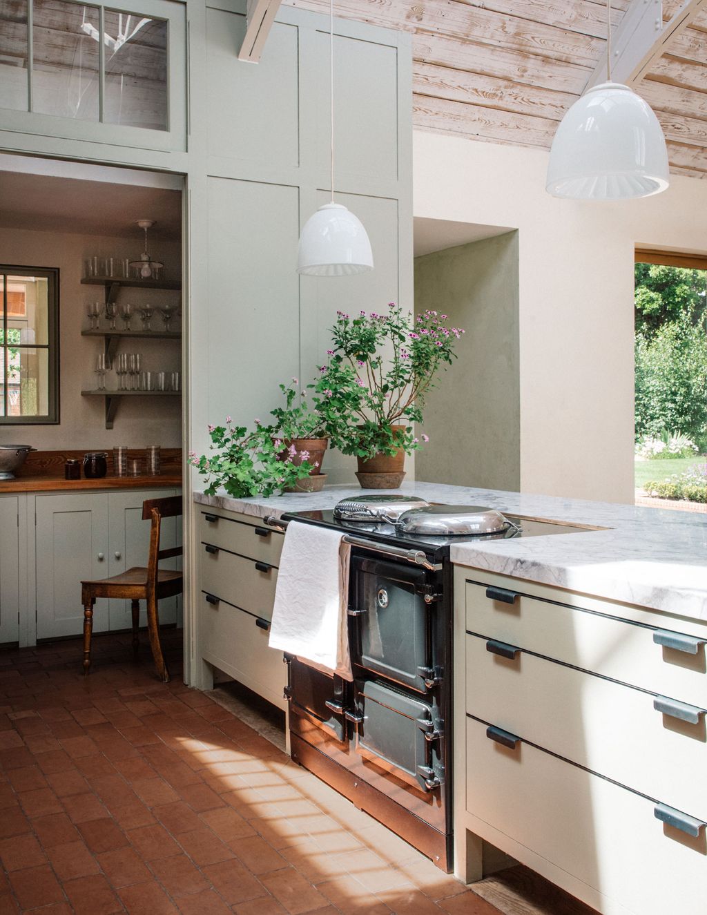 Image may contain Indoors Room Kitchen Kitchen Island and Furniture
