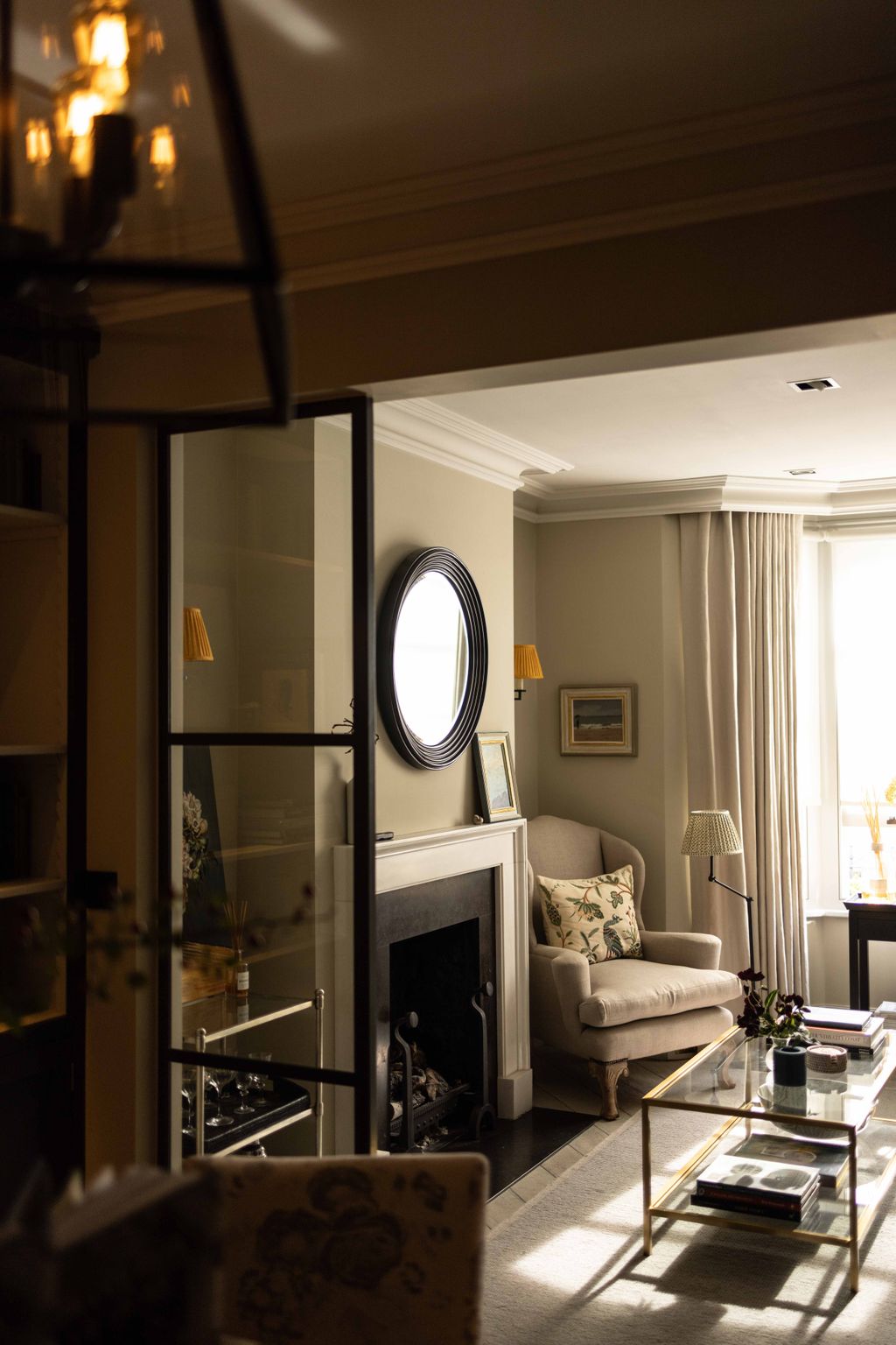 Image may contain Living Room Room Indoors Furniture Interior Design Couch and Fireplace