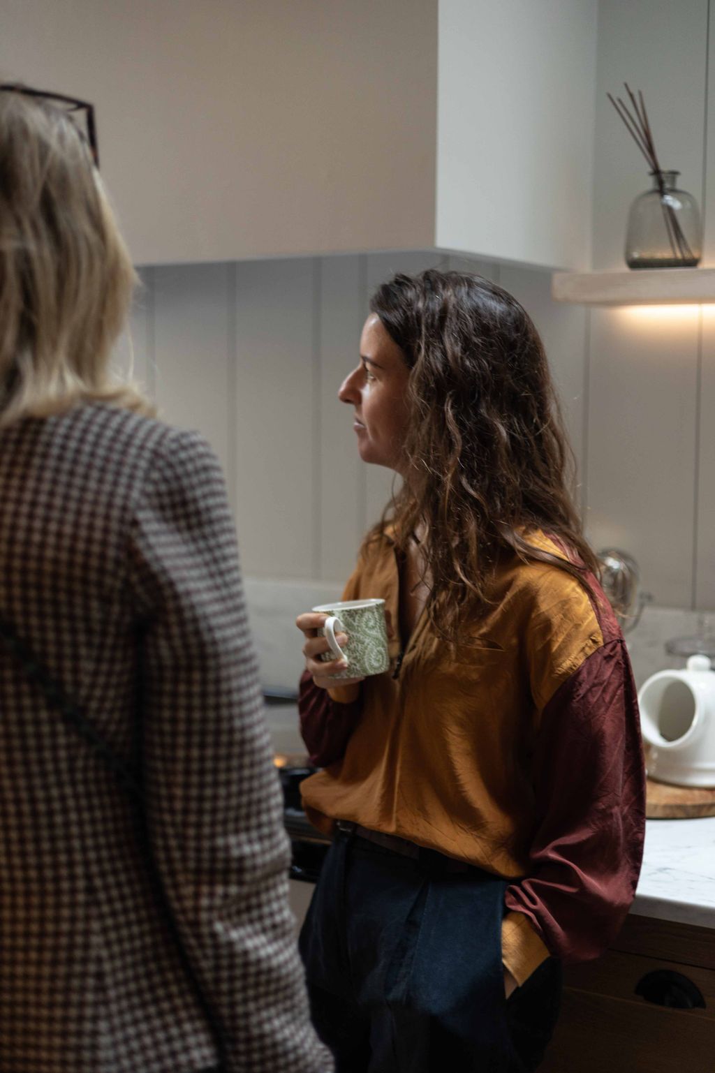 Image may contain Human Person Restaurant Coffee Cup Cup Home Decor Clothing and Apparel