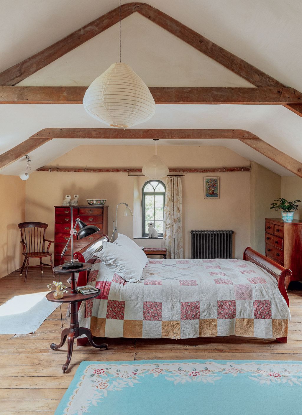 Geetie and Guys attic bedroom was derelict when they moved in but is now a charming space filled with auction finds.