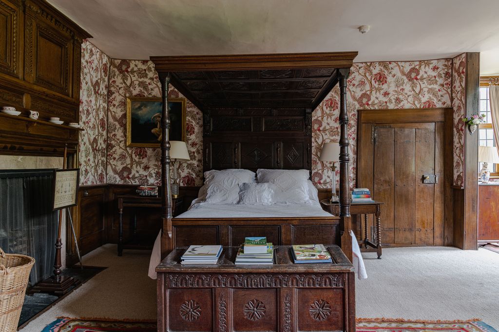 The Bennison walling cloth follows the rise and fall of this venerable old room. The bed was made up from old pieces by...