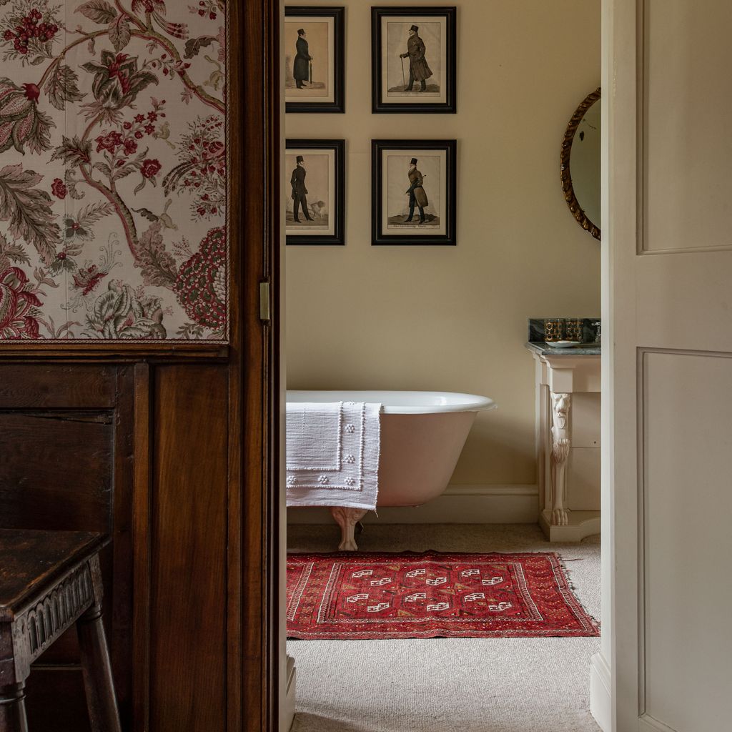 In the alcove off the Oak Bedroom the colours and patterns work well together from flowers to flame stitch. The basin in...