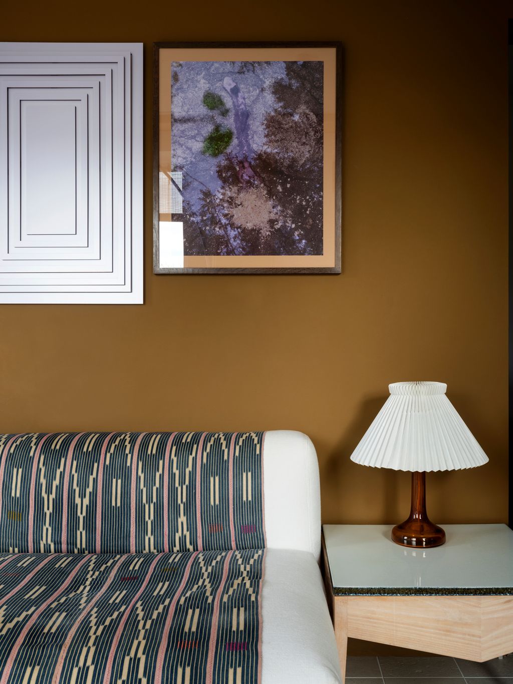 De Padova Eres sofa to the right a photographic artwork by Naomi Akvama to the left artworklamp by Lisa Mcdonald vintage...