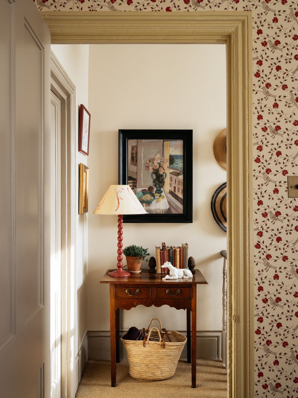 The view onto the landing from the spare bedroom with a table that Charlotte found on eBay years ago and a Matisse print...