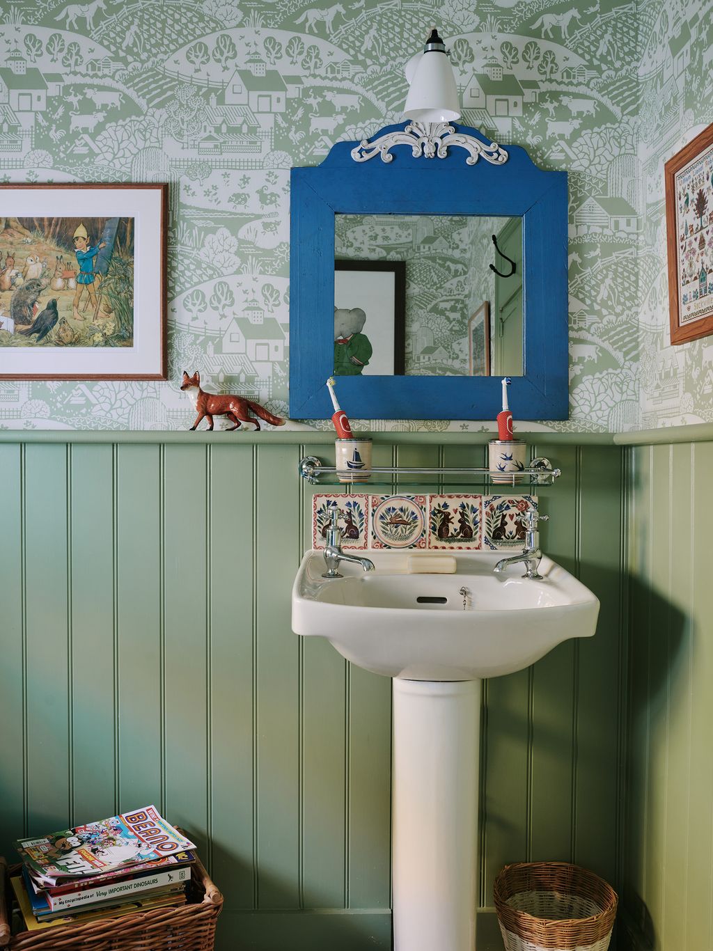 Wallpaper in Farrow  Ball's ‘Gable Green creates a cosy but fresh feel in the children's bathroom. The light is the...