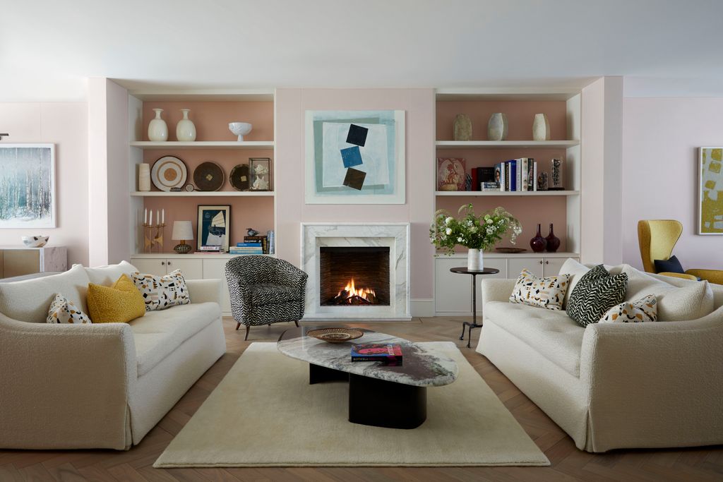 Image may contain Living Room Indoors Room Furniture Table Interior Design Couch Coffee Table Fireplace and Hearth