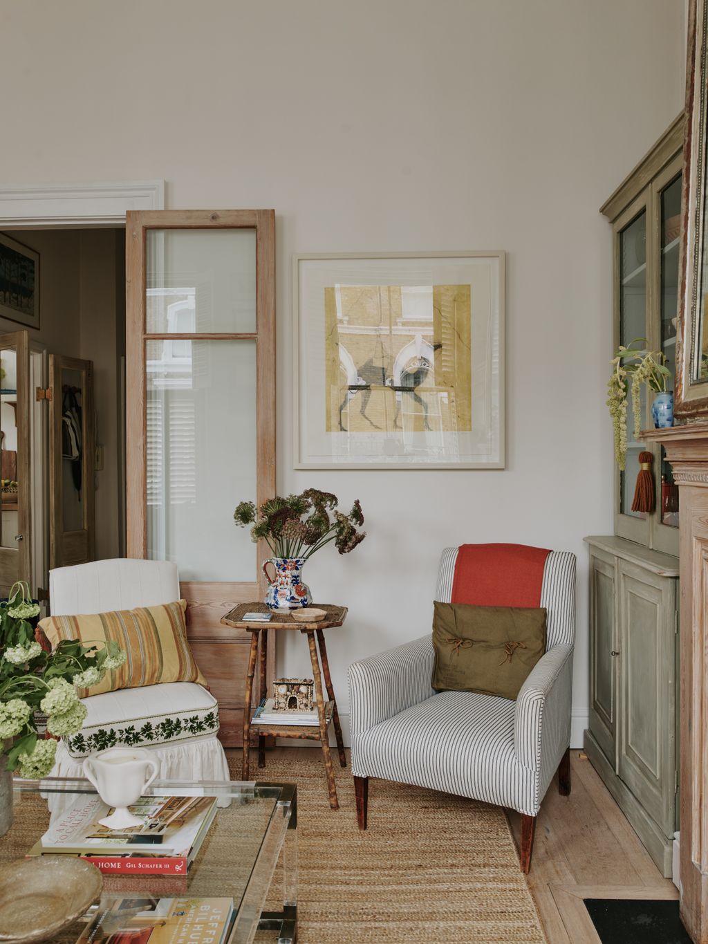 Bamboo side tables are vintage. Bamboo pinch pin cabinet from Vinterior. Ticking stripe chair bought in auction green...