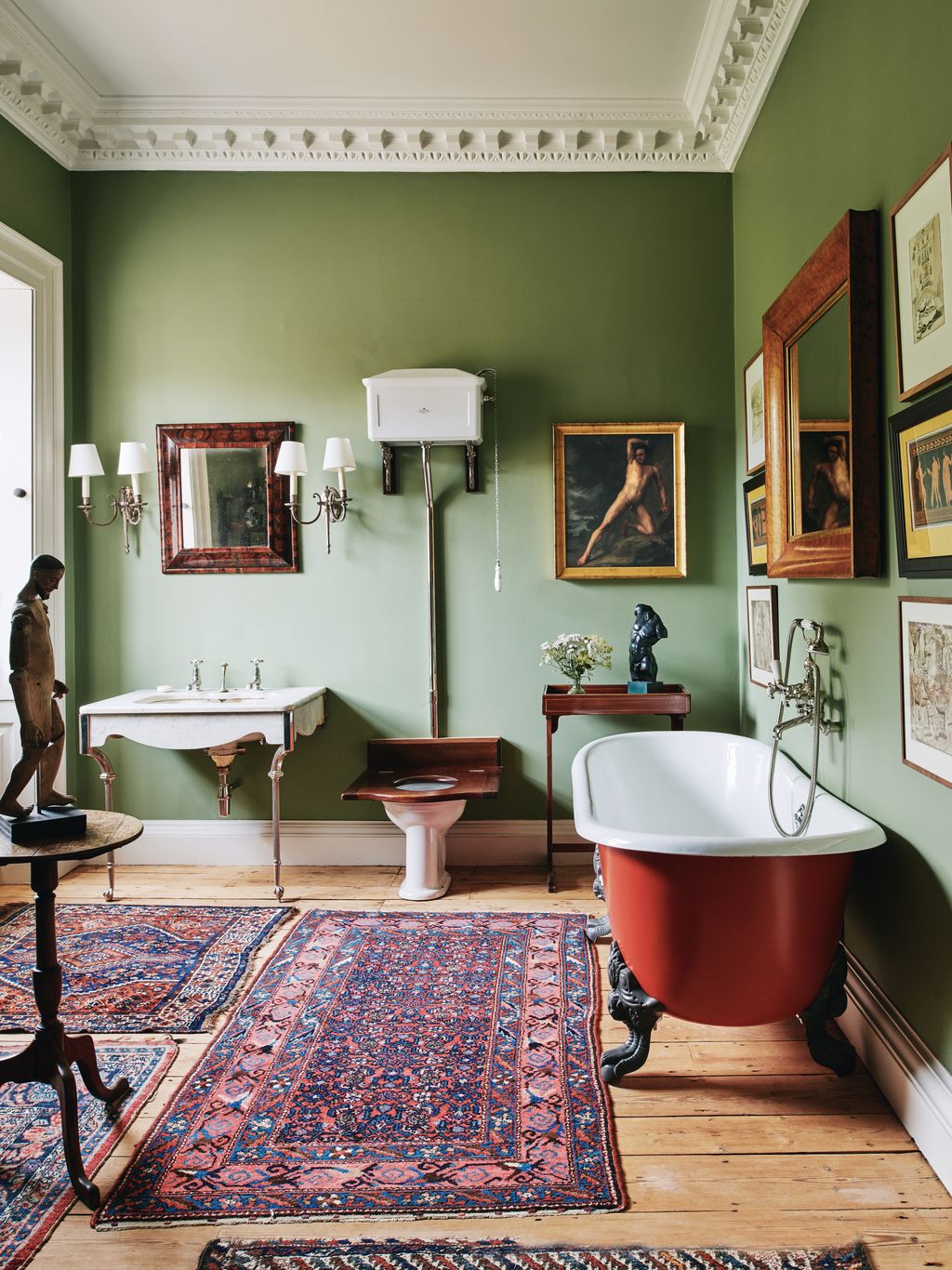 Fenwick Tilbrooks ‘Shepherds Delight paint used on the bath was inspired by Stanley Spencers painting Washing Lockers.