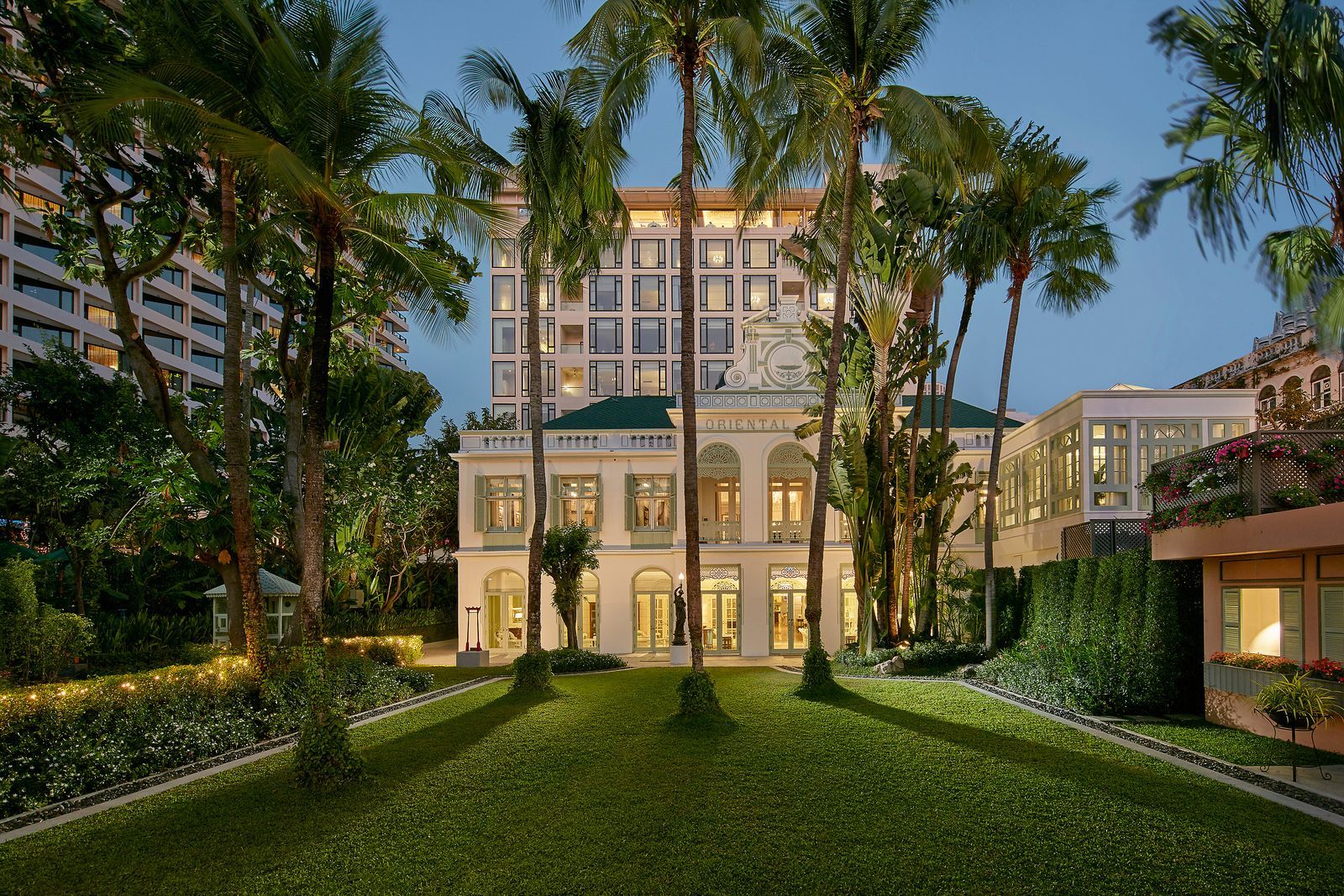 exterior of a building at dusk with trees