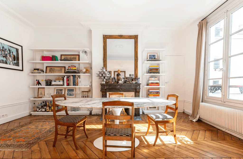 Situated on one of Paris' most coveted streets this sunny twobedroom apartment is effortlessly stylish and a perfect...