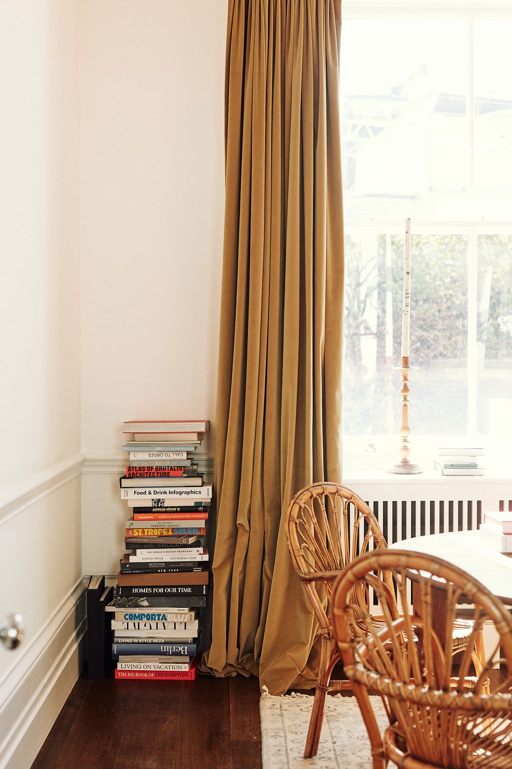 Upstairs in a sunny corner of the sitting room Juana has created a charming seating area.