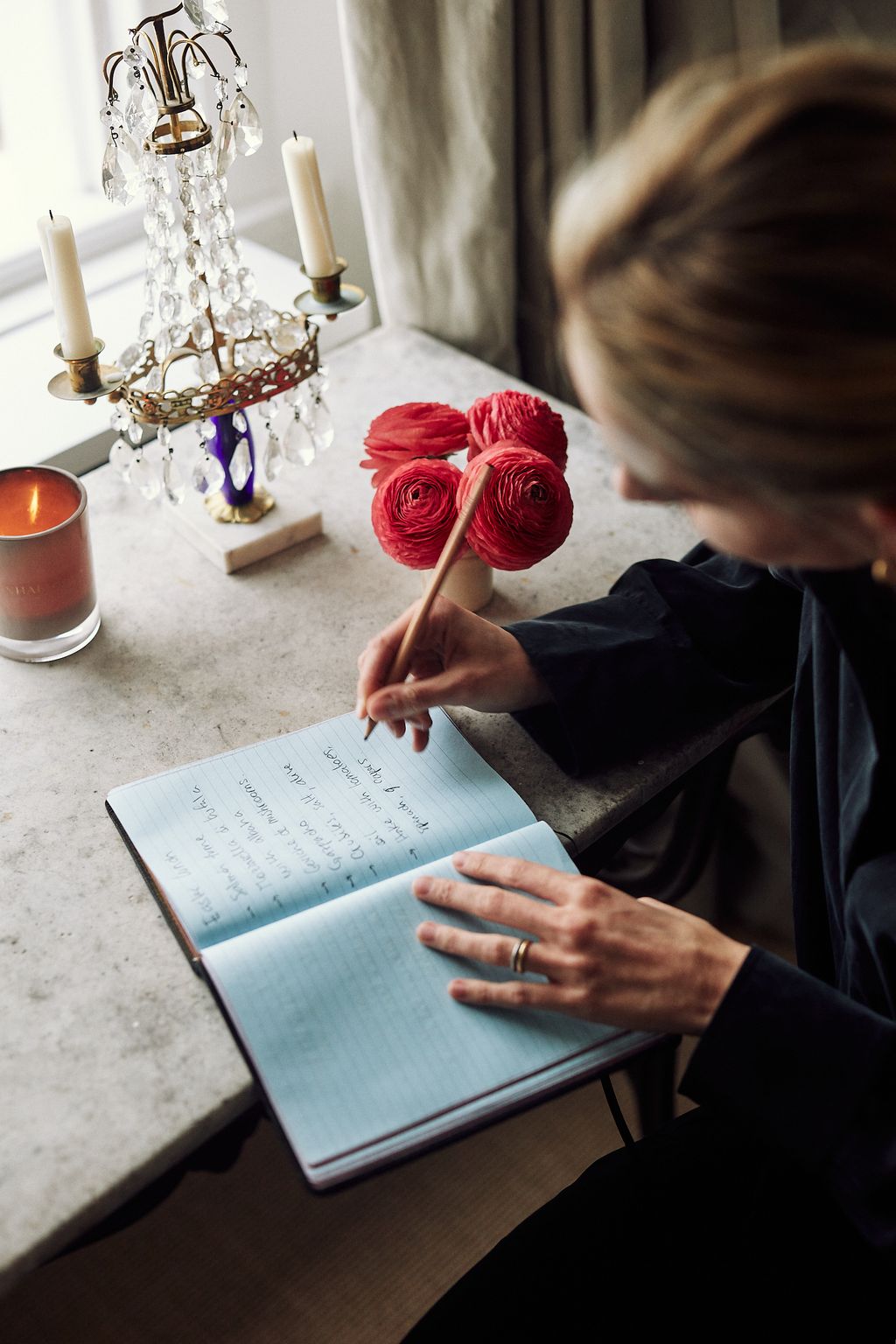 Seen writing out the shopping list for her Easter lunch the table is Lorfords Antiques the chair is from Mestizo Store...