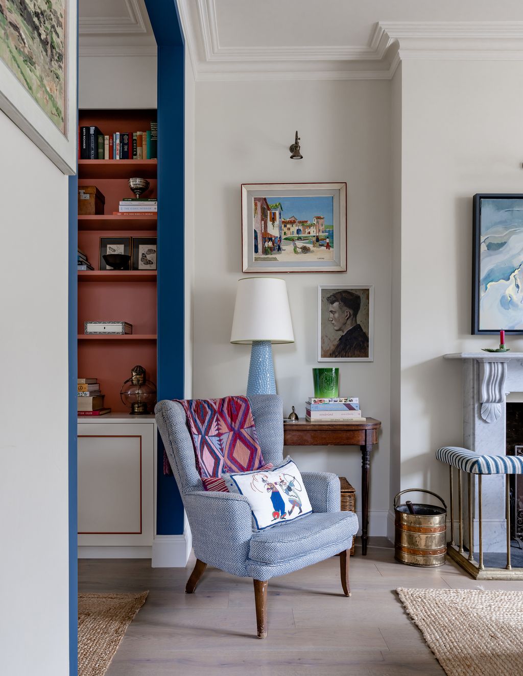 The joinery in the TV snug is bespoke designed to both display objects and hide mess.