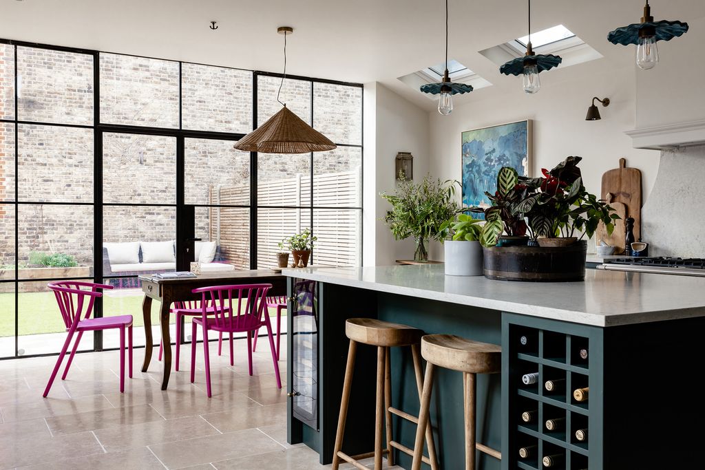 Designed alongside Wilstons of Avebury the kitchen island is the focal point of the room. It is painted in ‘Studio Green...