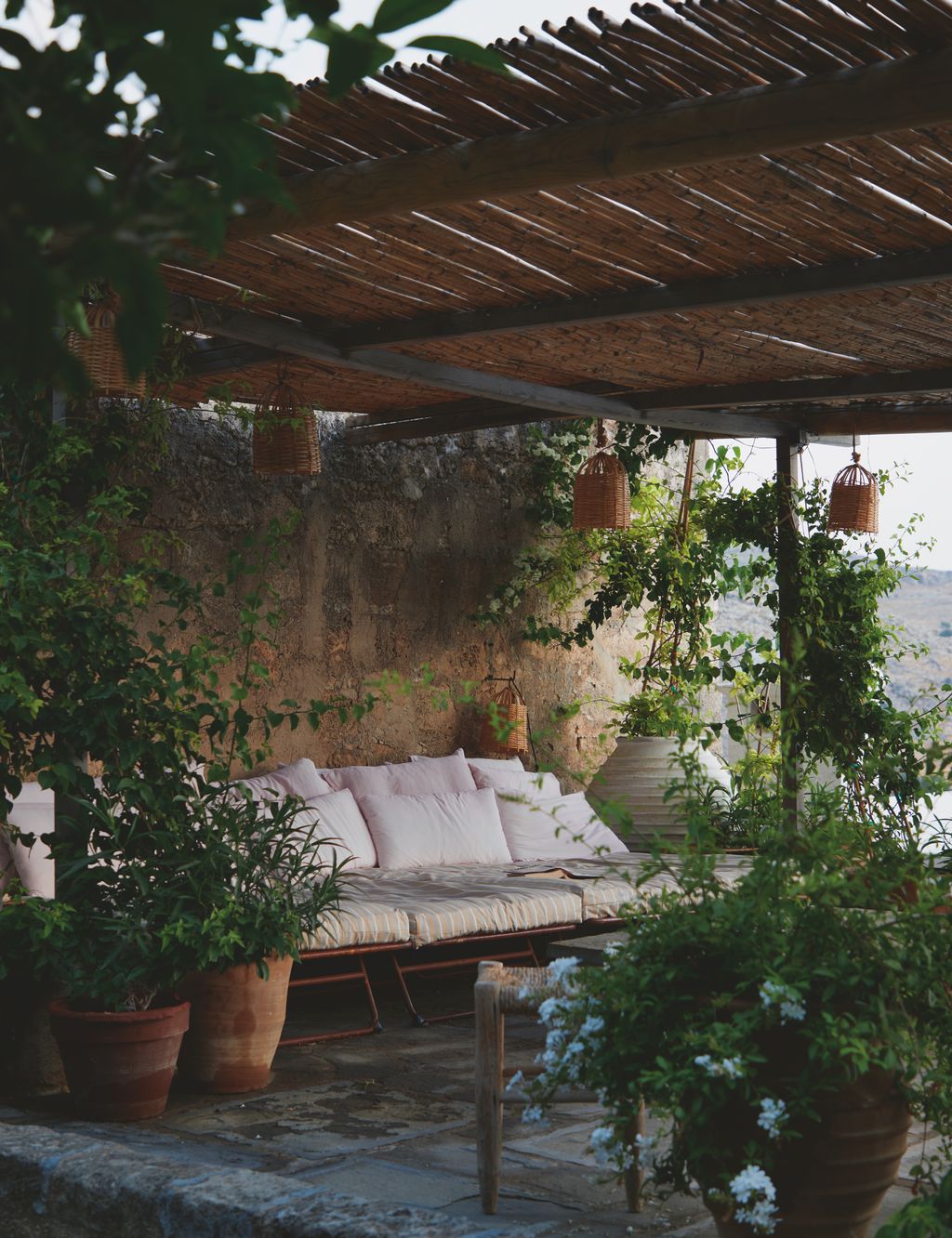 During my days in Rhodes with the couple I often found them reading under the covered terrace next to the houses lemon...
