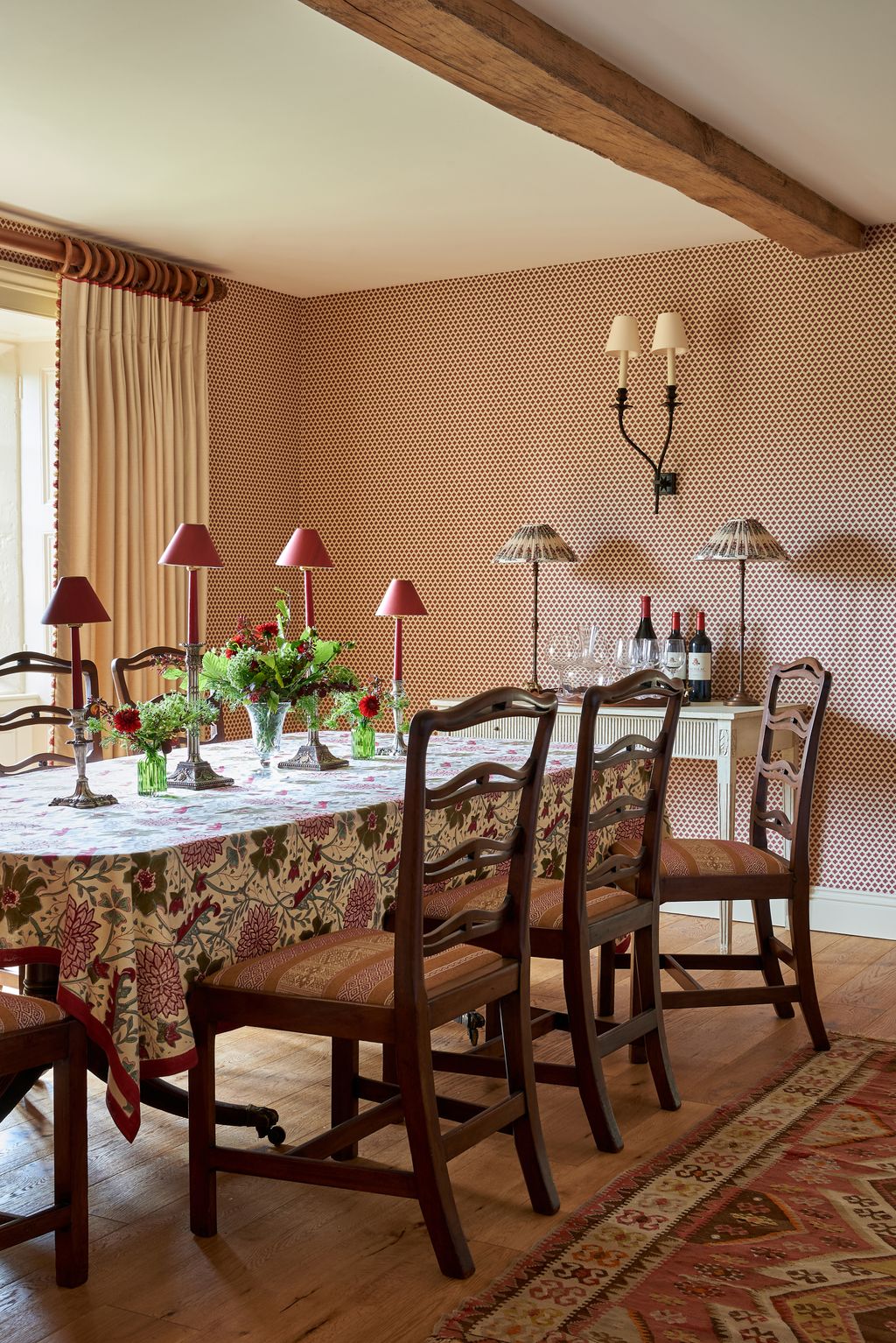 The dining room is elegant yet still welcoming. The table was an antique find from Prior  Willis as were the dining...