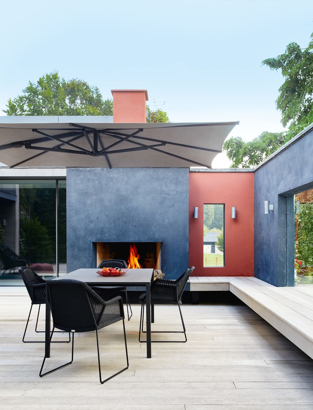 Caneline furniture forms an inviting dining area.