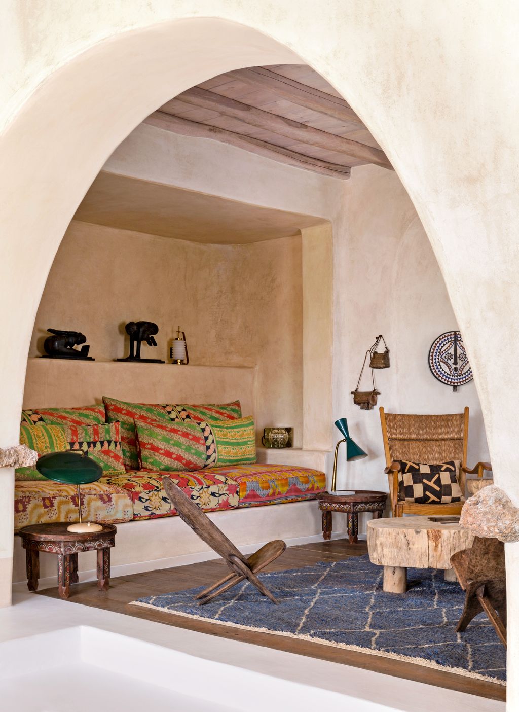 The blue Berber rug from Marrakech brings colour to the television room.