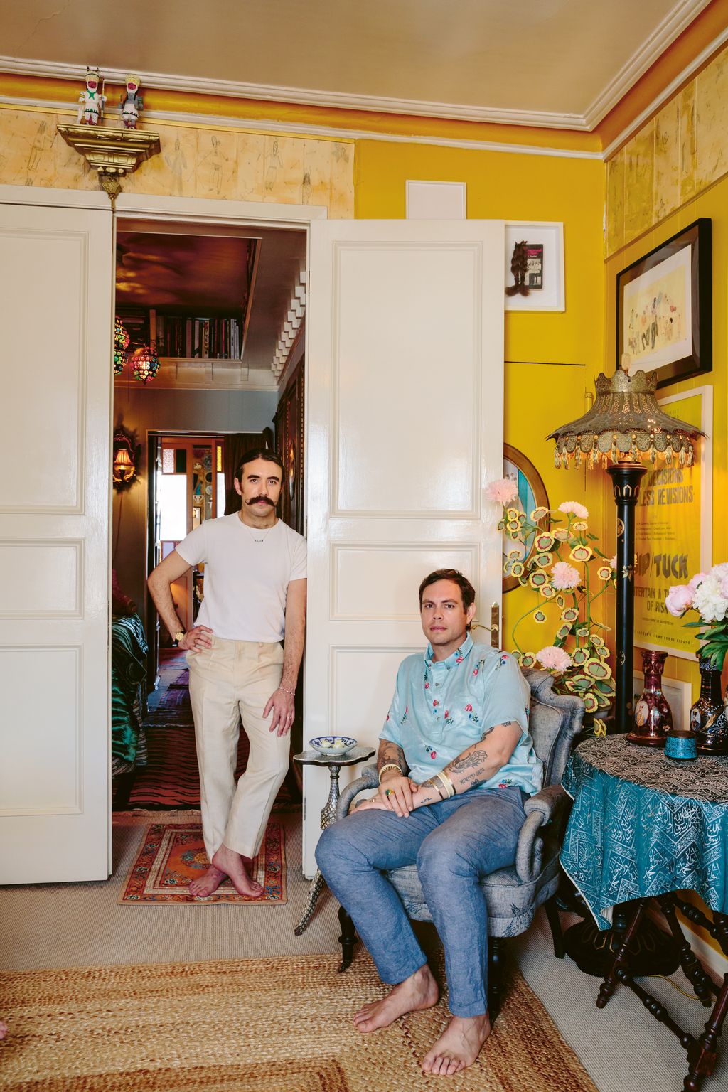 Sinan Tuncay  and Sean McNanney in their apartment