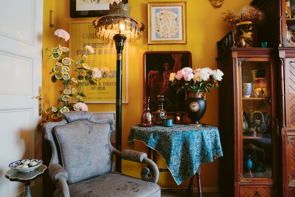 In a corner of the sitting room a Biedermeier armchair is teamed with an Aesthetic Movement floor lamp. Ottoman hookah...
