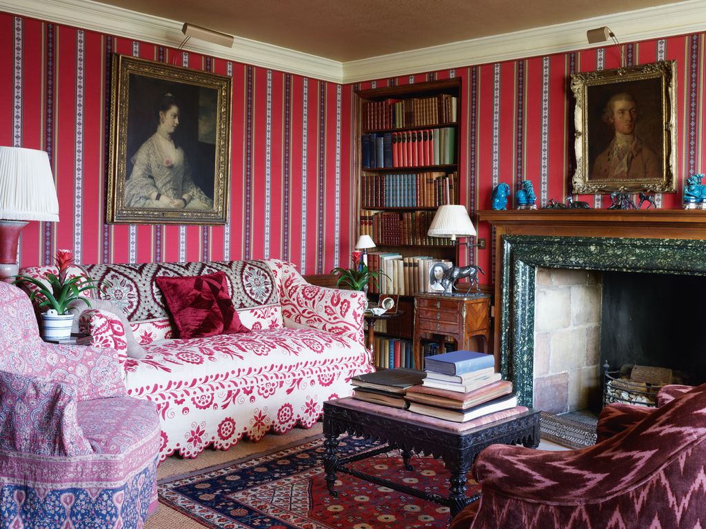 Set off by walls in Mongiardinos layered fabric stripes are a Thomas Gainsborough self portrait and a painting of Lady...