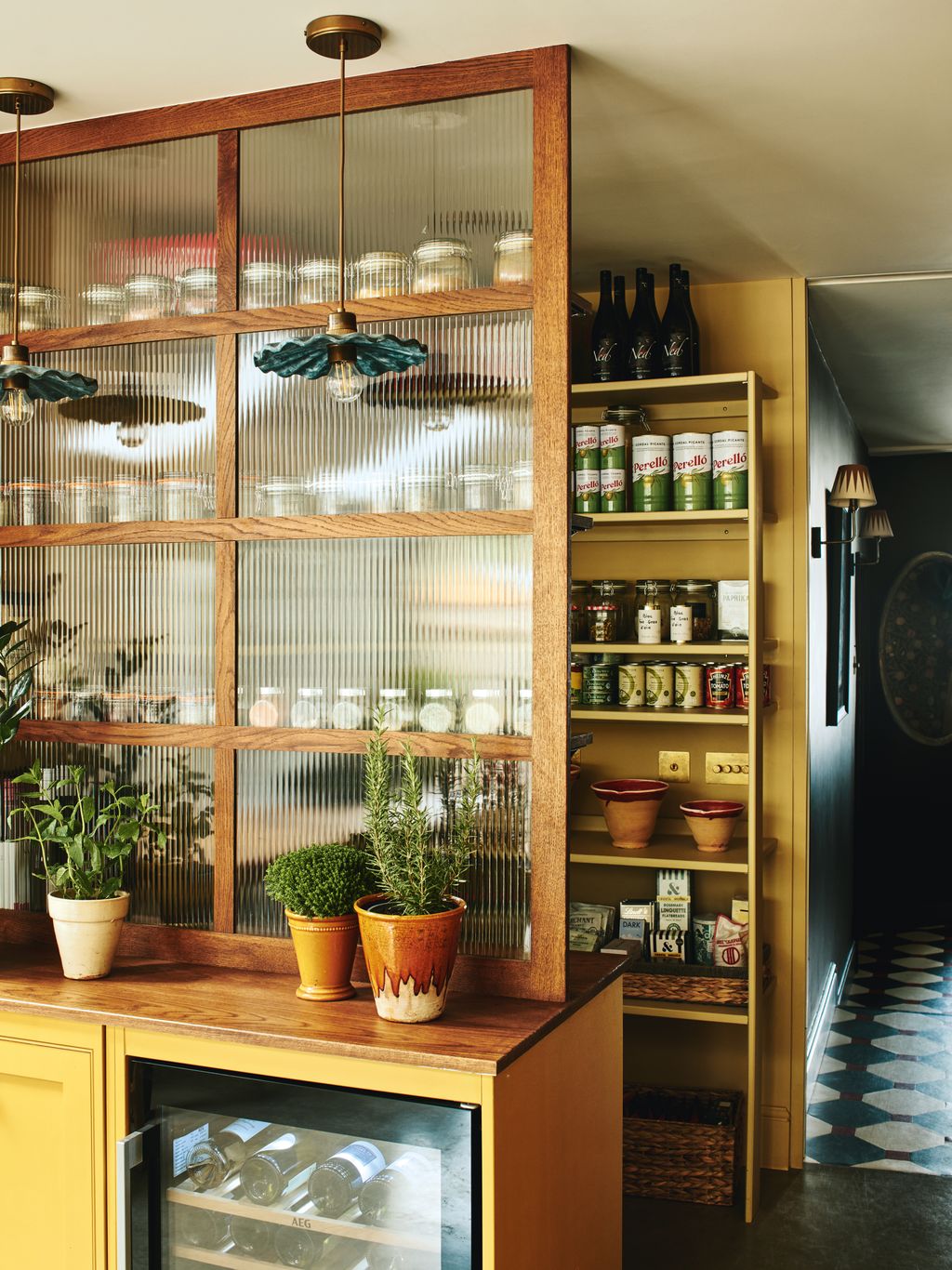 In this inviting London terrace house designed by Laura Stephens a privacy screen has been used to neatly conceal the...