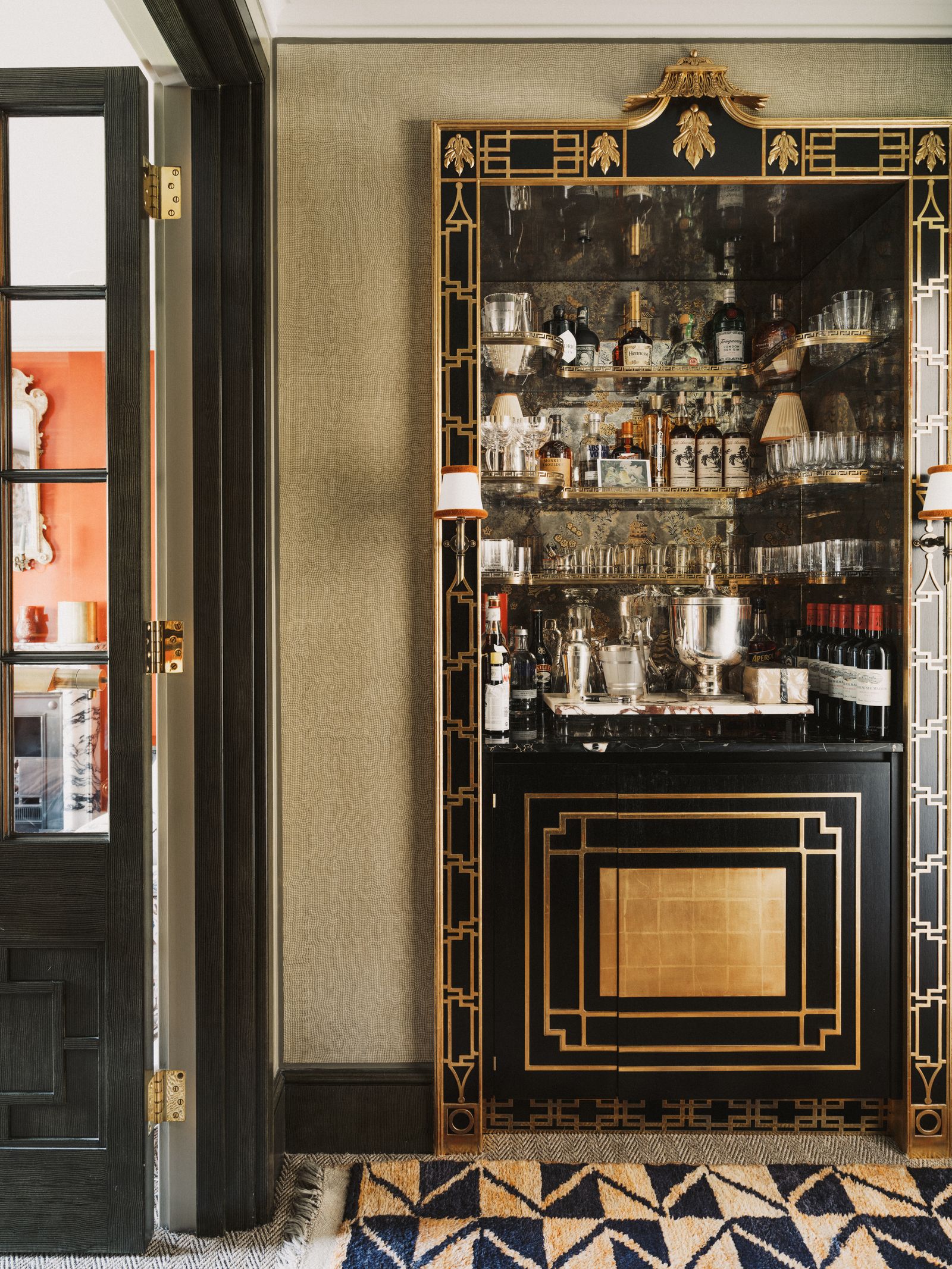 A bar ‘nook has been created on the landing just off the drawing room. Its verre glomis surface is etched with images of...