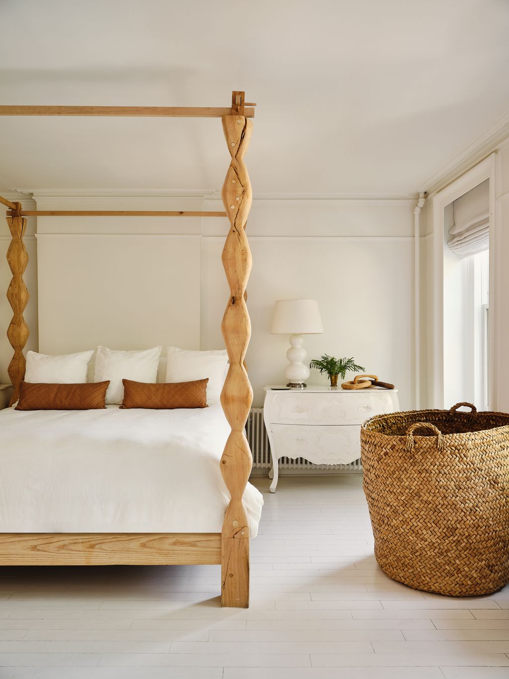 Fitzhugh made the fourposter for the main bedroom with wood from trees felled in New Yorks Finger Lakes region