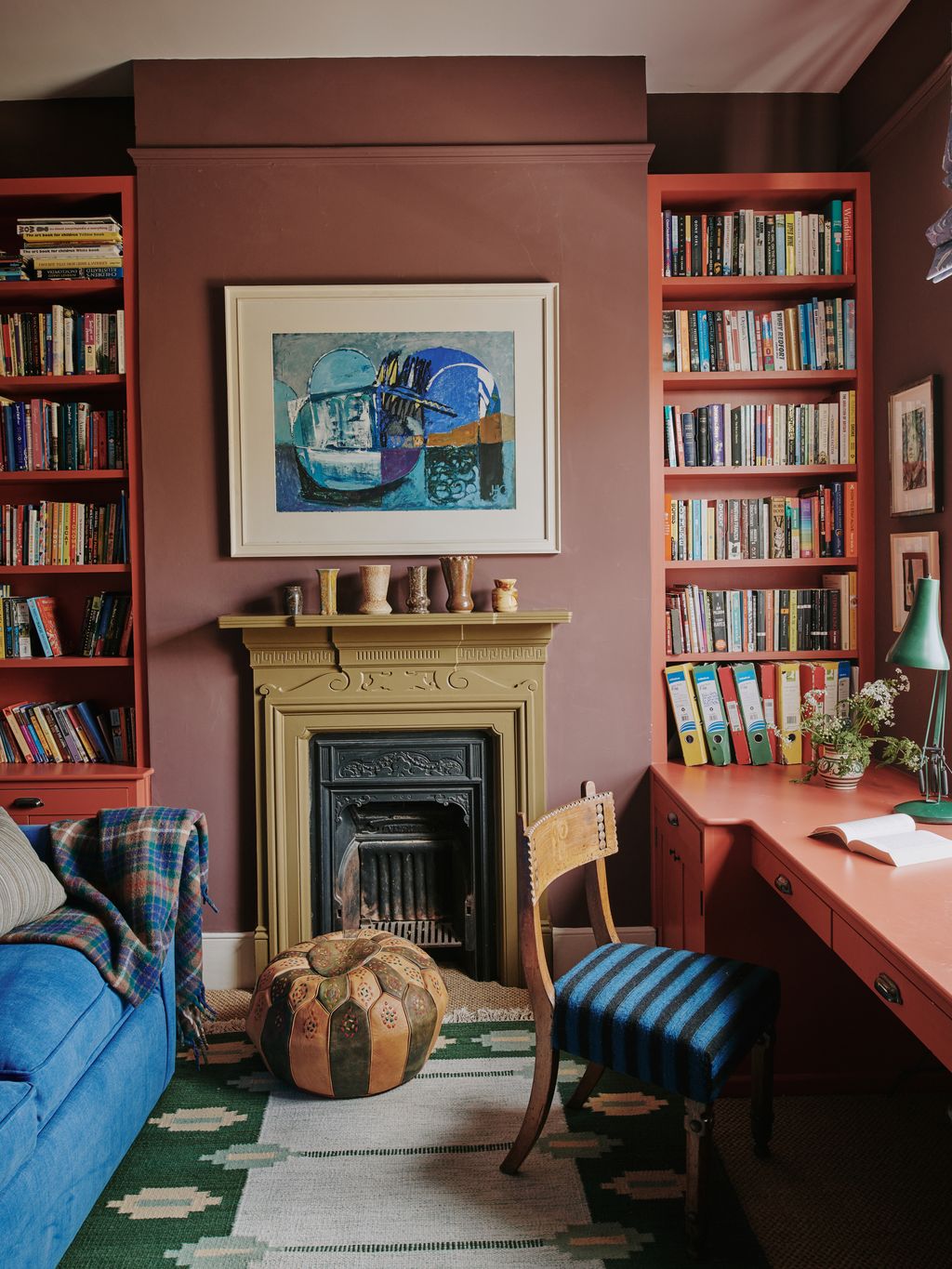 The walls of this studycumguest room in Tamsin Saunders' London vicarage are a dusty purplebased brown which absorbs a...
