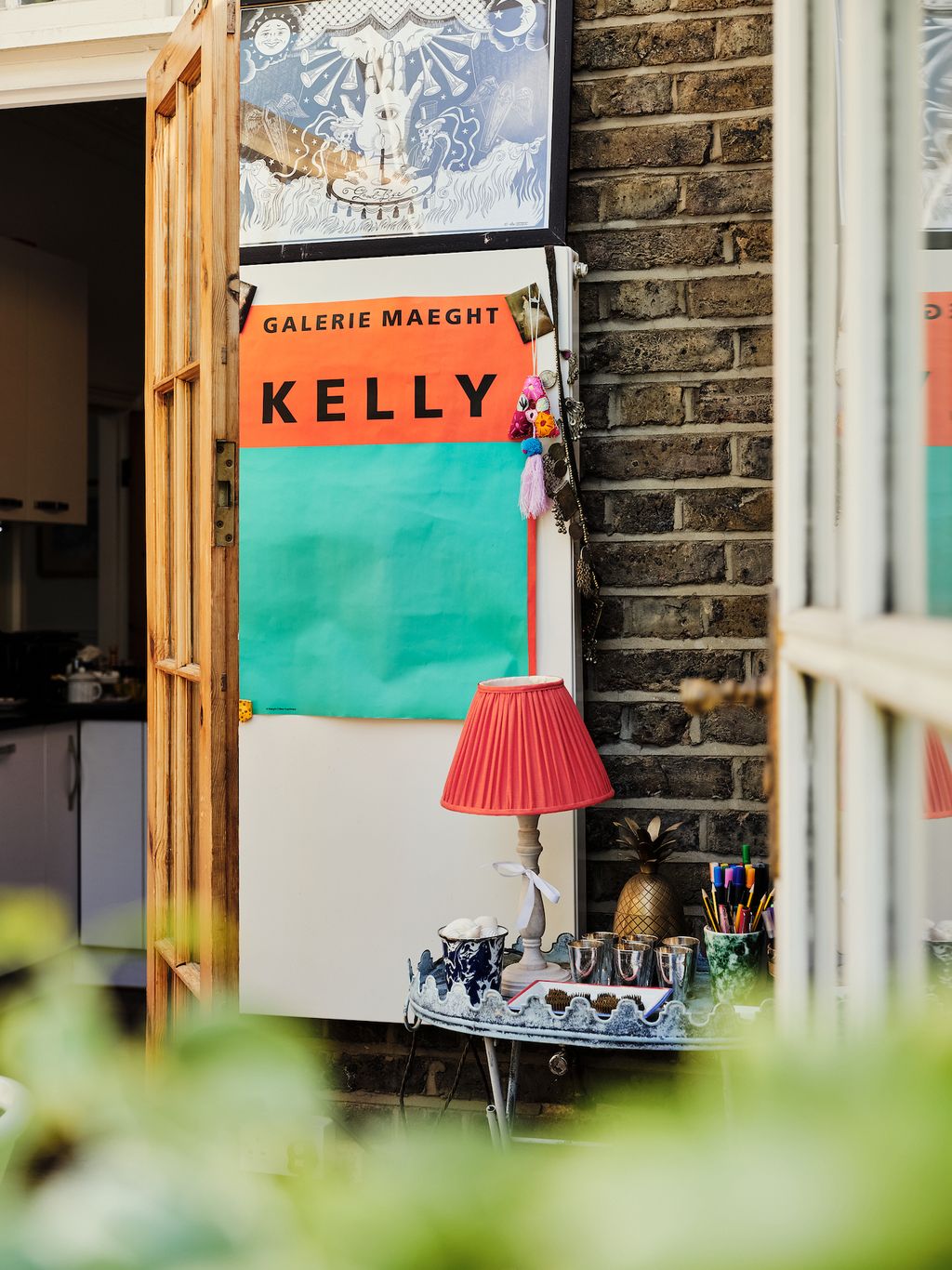The light blue table from Kempton market. The lamp is from Pooky.