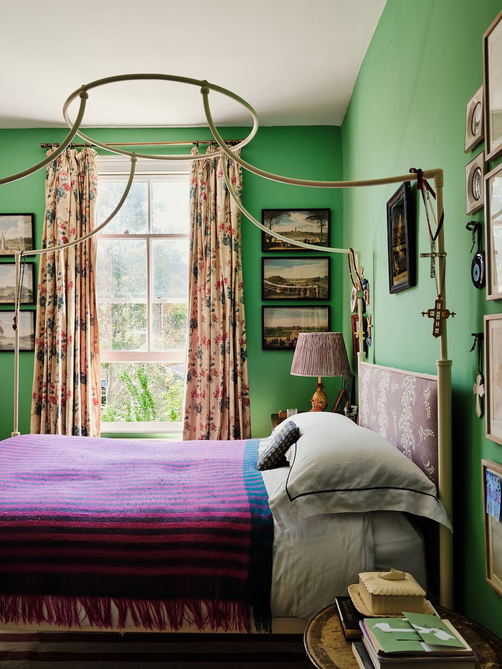 In Ariadne's bedroom a bed from the Original Bed Company has been upholstered in Carolina Irving Textiles ‘Mimosa Vine....