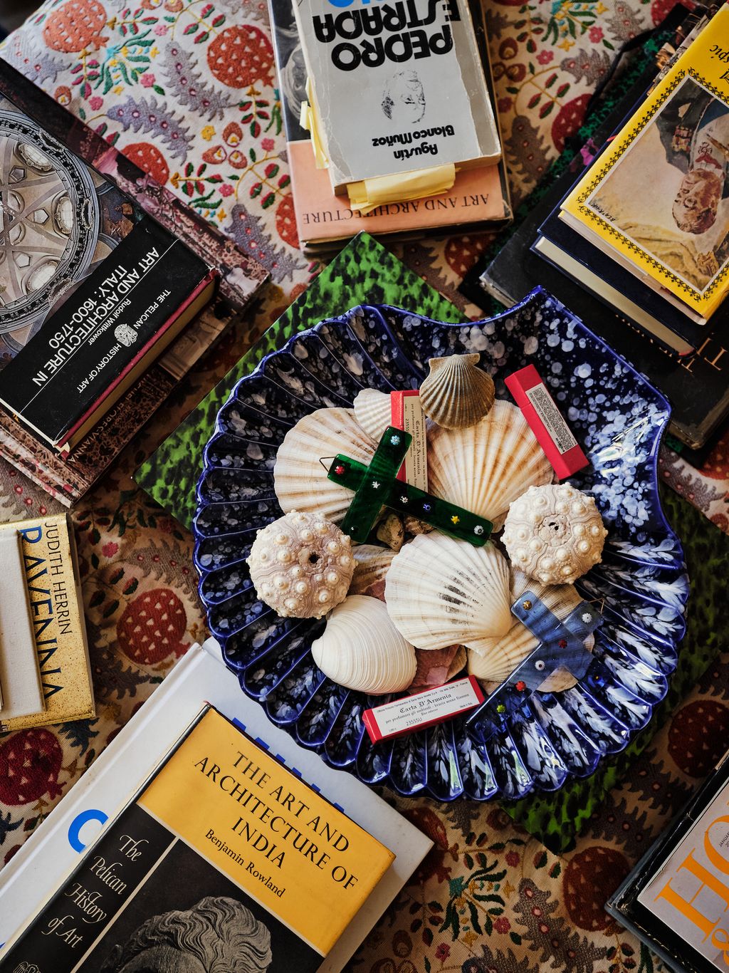 A Carolina Irving and Daughters ‘Jumbo Concha is filled with shells Murano crosses and ‘our favorite Carta dArmenie from...