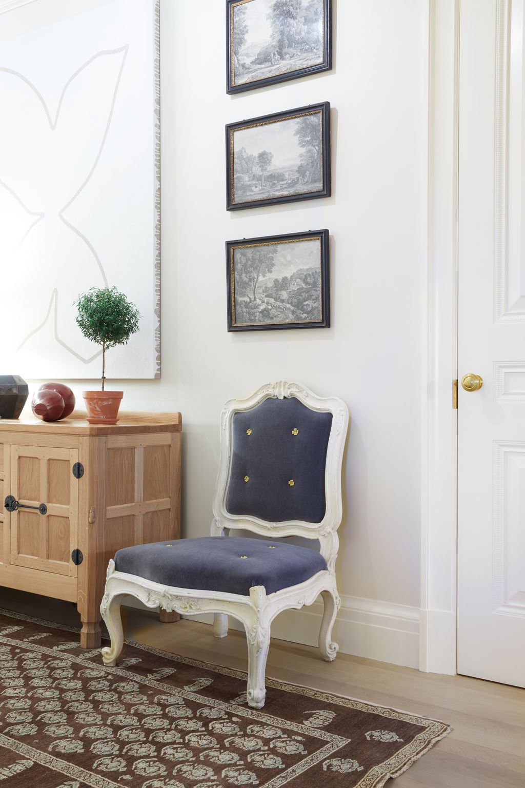 In the gallery the painting is by Paul Kremer and the mid18thcentury chair  comes from Gerald Bland.