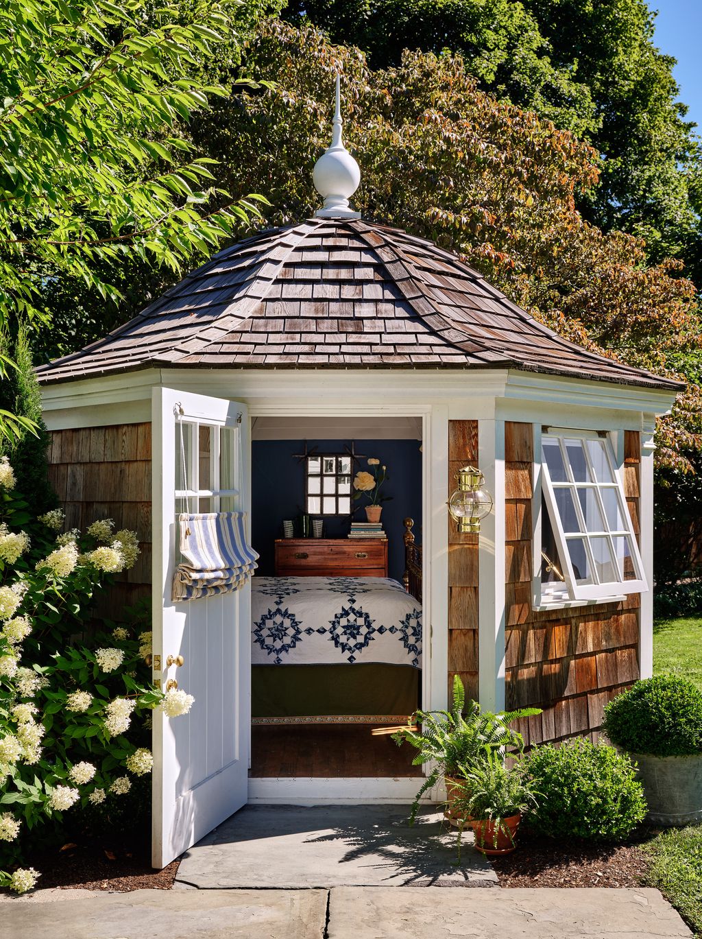 The garden features two outbuildings by Hillbrook Collections which are designed and made off site. They are delivered...