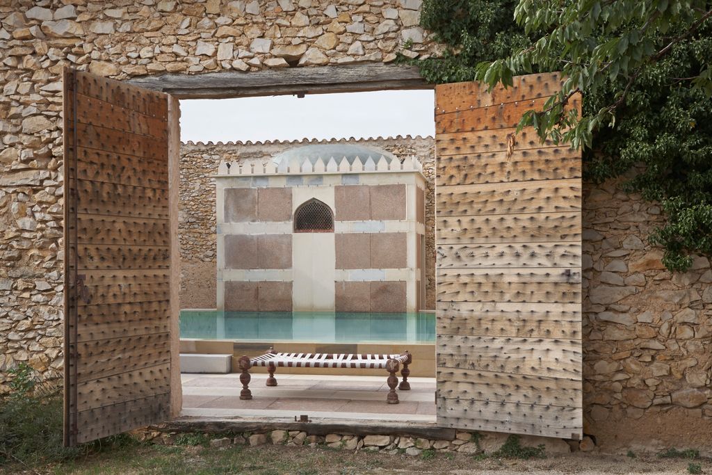 The doors are constructed in a local vernacular style.