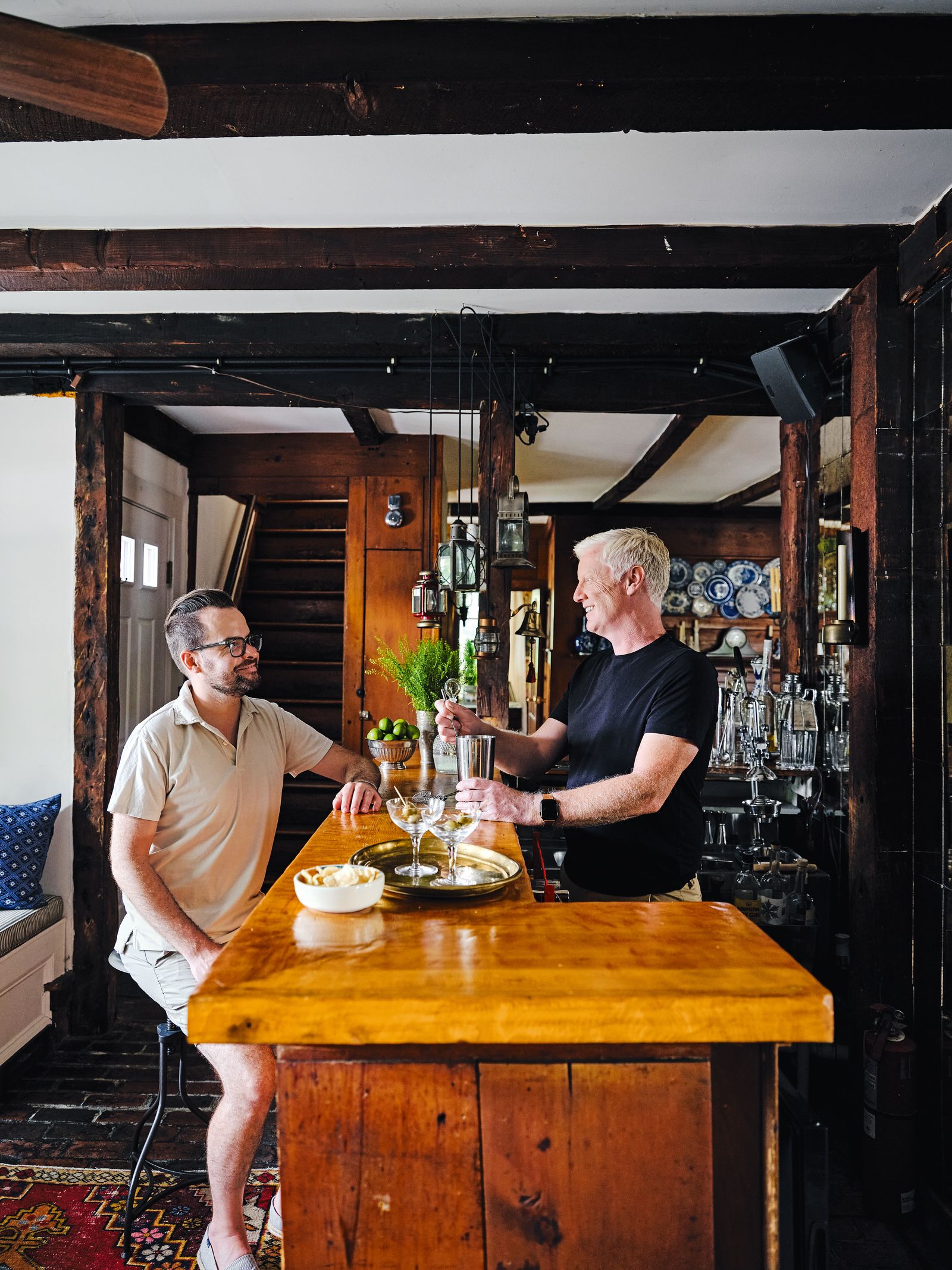 At the old bar in the restaurant that is now their home.