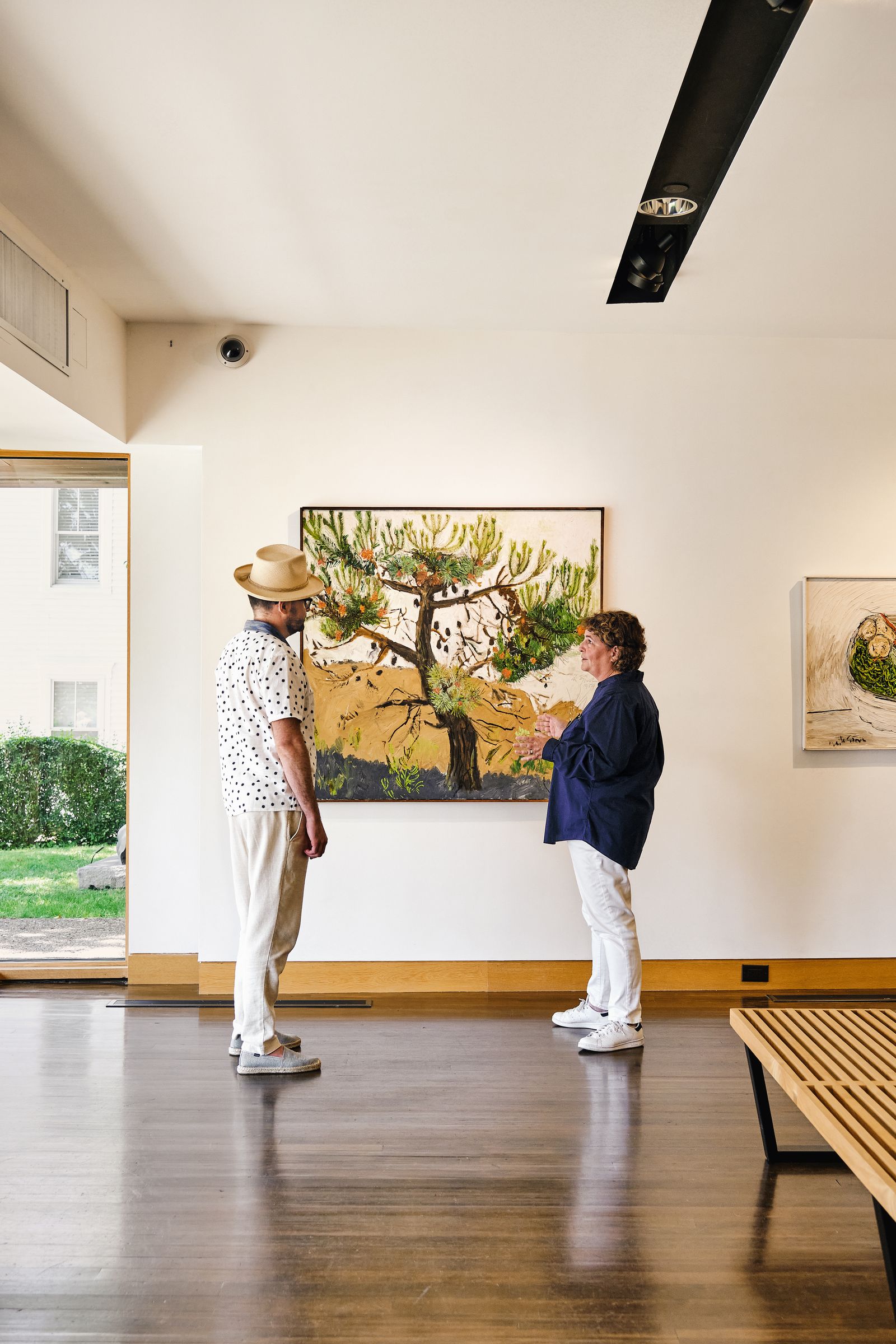 Kevin in the groundfloor gallery of Provincetown Art Association and Museum with its CEO Chris McCarthy in front of Mary...