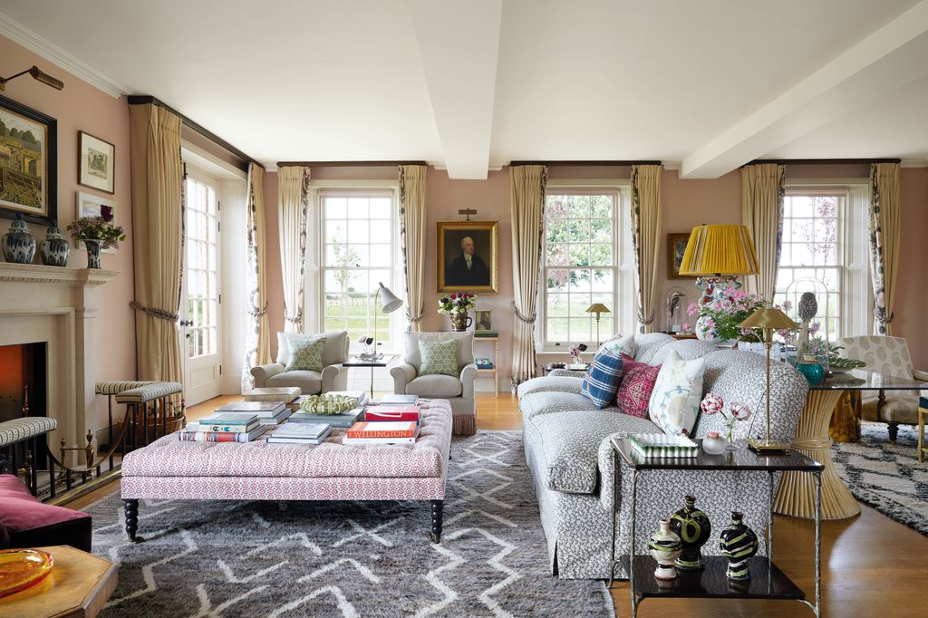 In the drawing room a generous ottoman in Galbraith  Pauls ‘Links partners a sofa in ‘Nathalie from Claremont.  The...