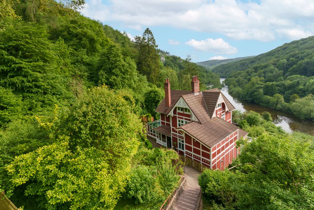 The unusual Scandinavianstyle Chalet Symonds Yat has one of the most beautiful locations in the UK perched on a slope on...