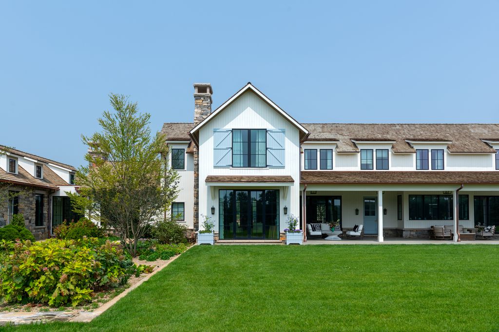 The exterior of the countryside estate on a farm in the hills of the Midwest.