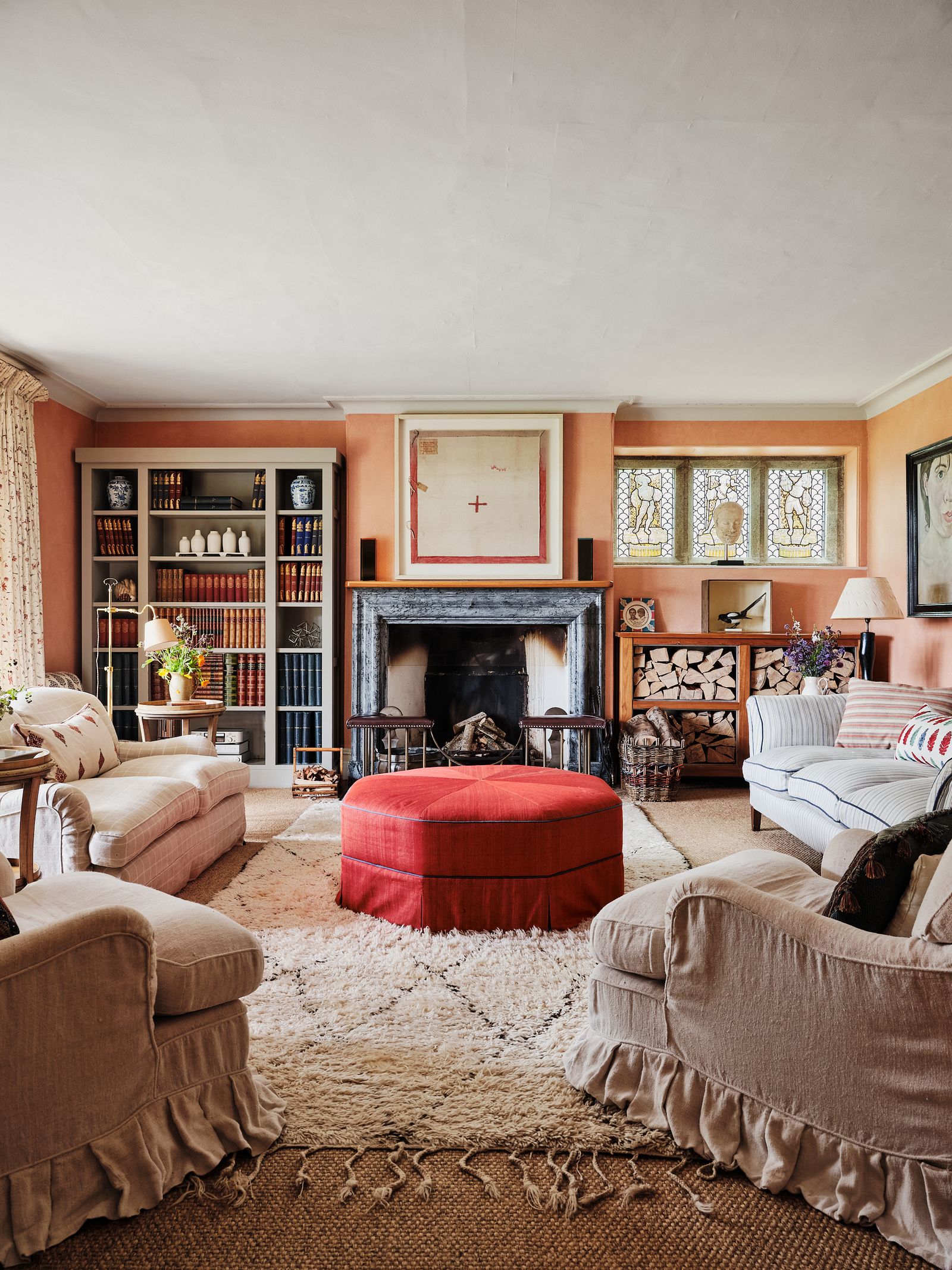 The sitting room in the newer part of the house was originally furnished by Robert Kime. Later Hugo's friend Camilla...