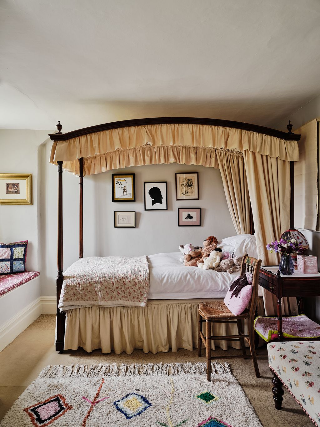 In Alba's bedroom is Hugo's grandfather's childhood bed re upholstered by David Mlinaric who decoratednbspHenbury Hall....