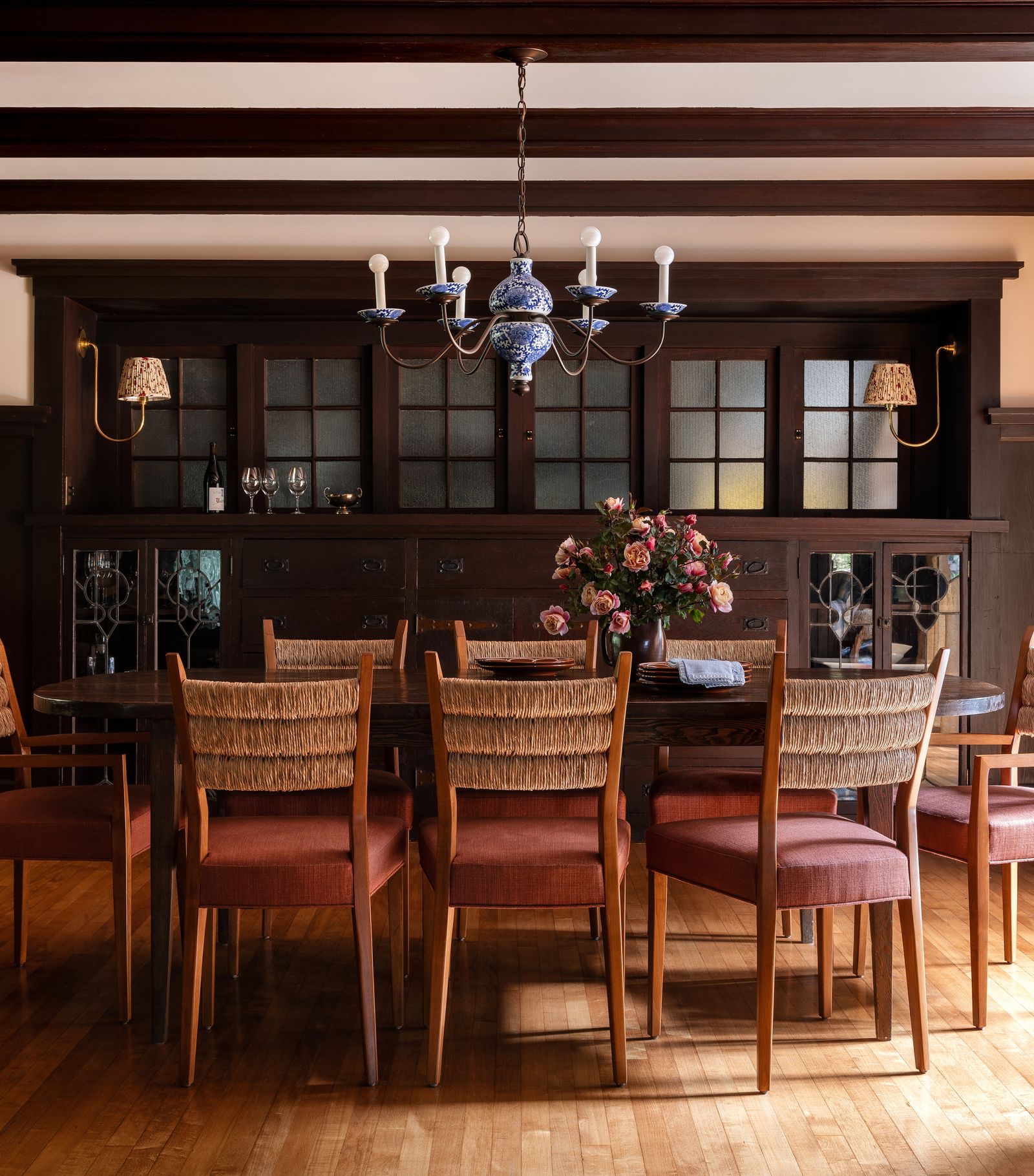 In the kitchen the ceiling was painted soft pink because Heidi felt white was too stark. The pendant light was a family...