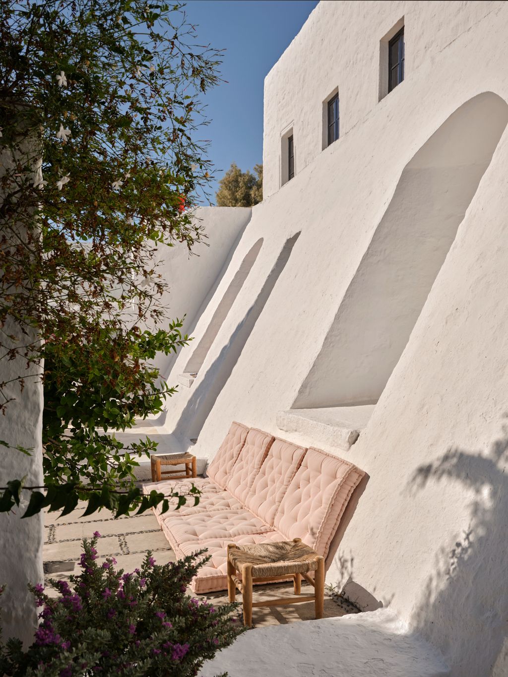 The buttress terrace is shaded by almond trees. JS came up with the idea to have a cement floor divided in rectangles by...