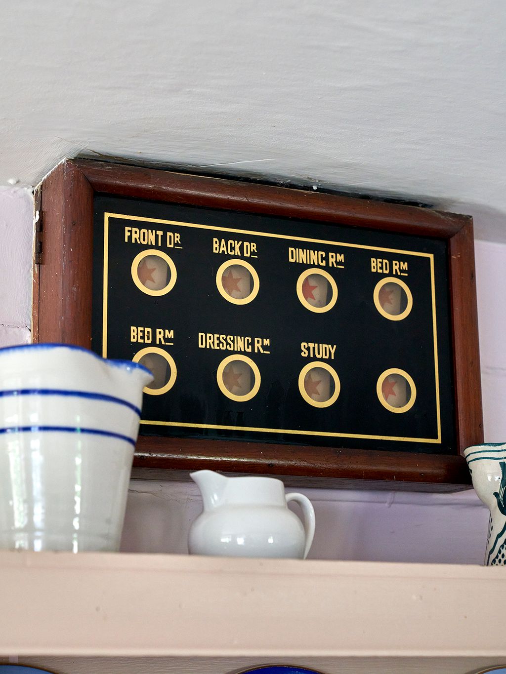 The serving bell box in the kitchen used to ring in two farm cottages across the road.